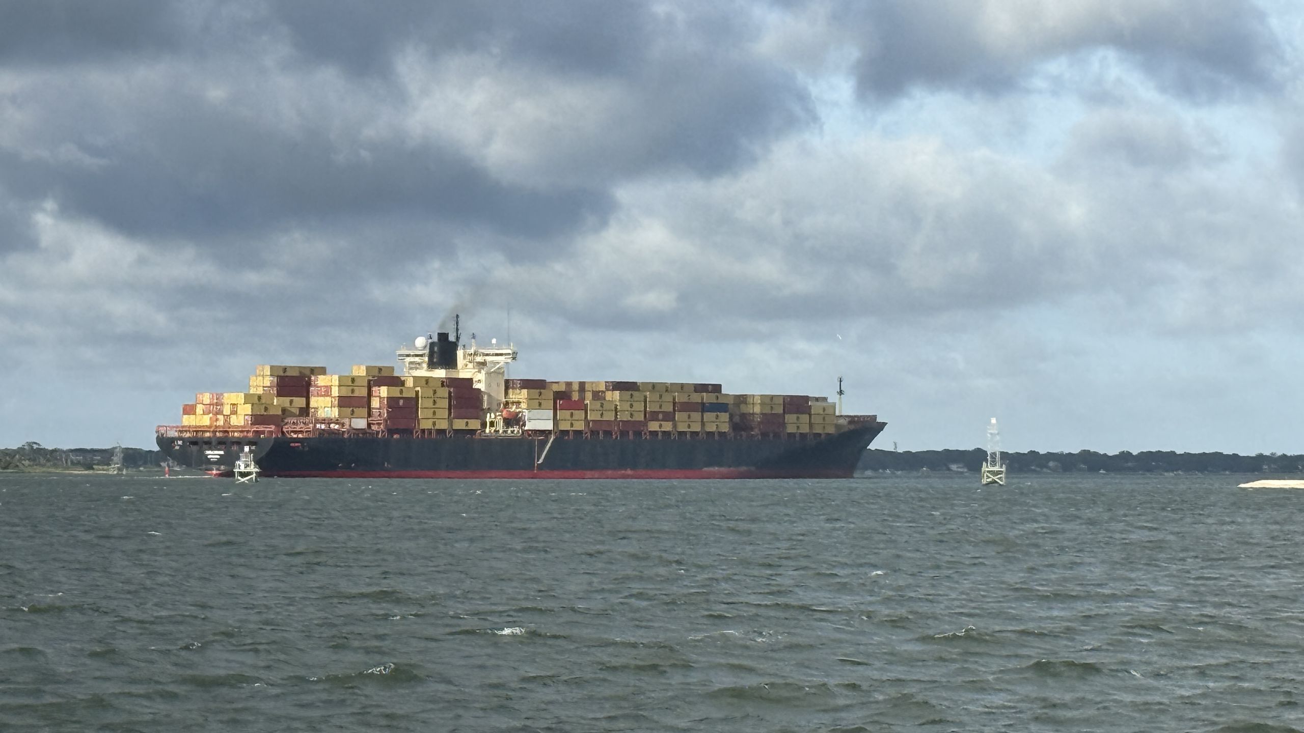 Container vessel underway near a bridge