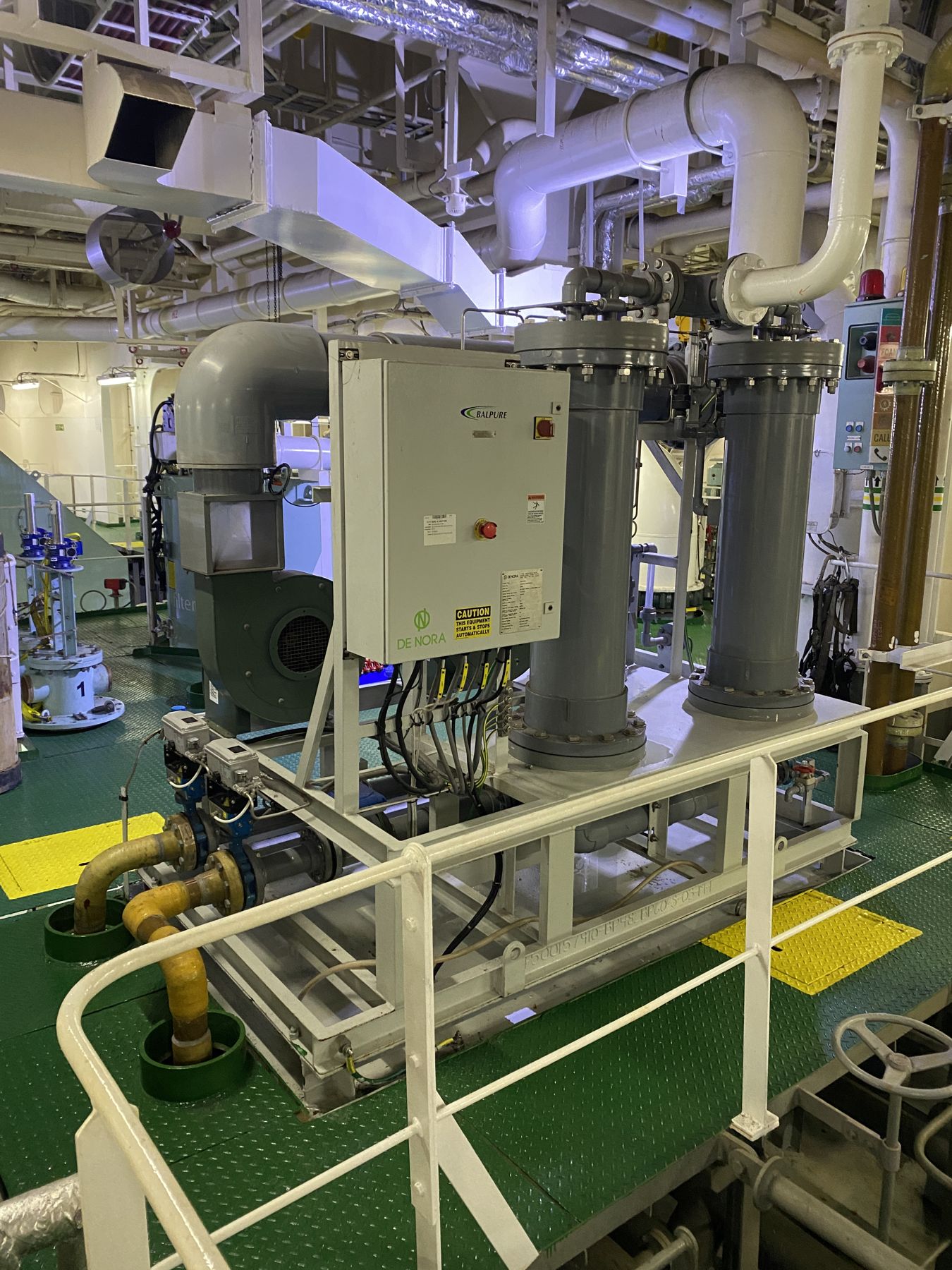 Ballast water piping and treatment equipment in an engine room