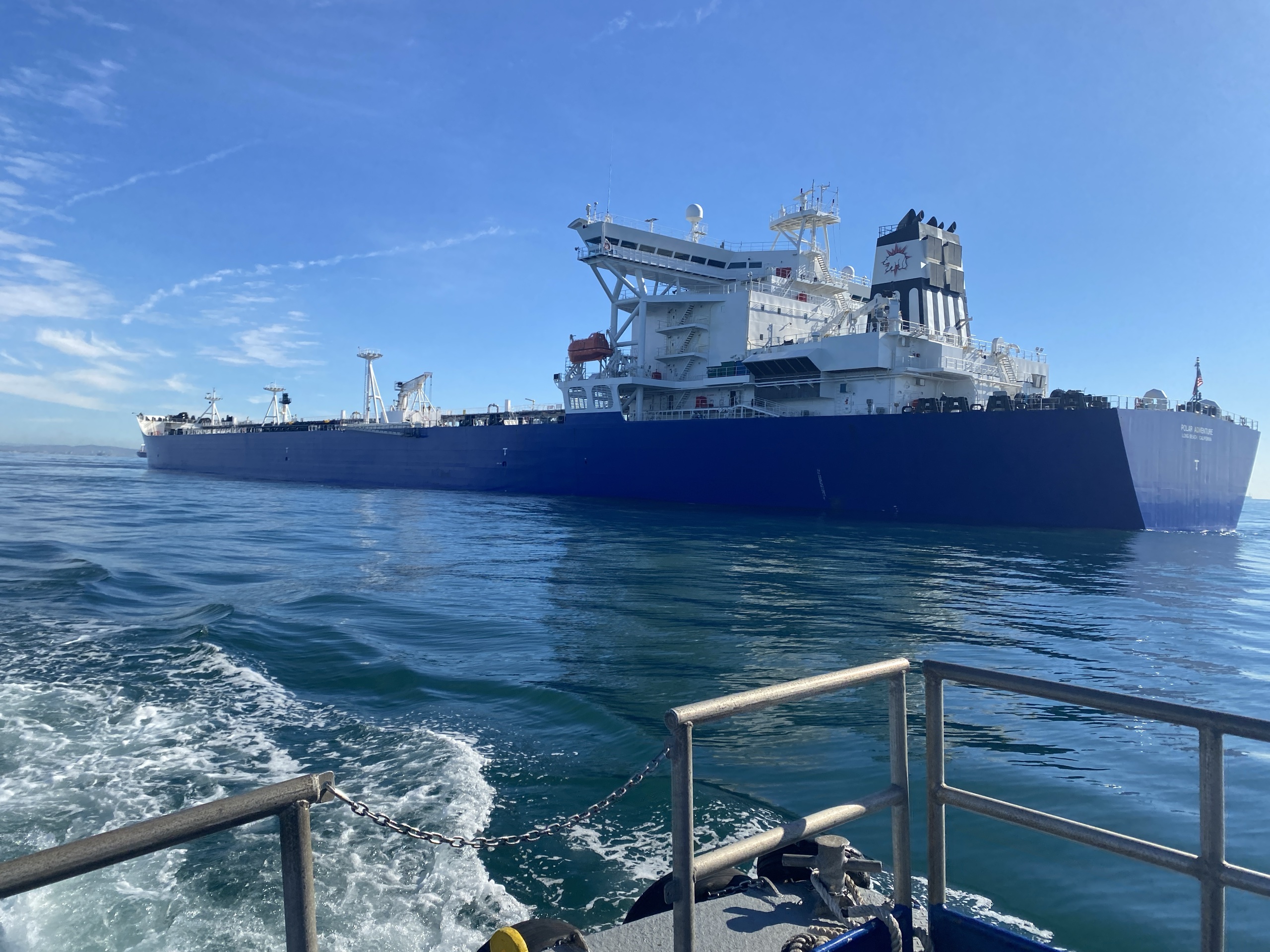 Panamax tanker underway seen from a launch